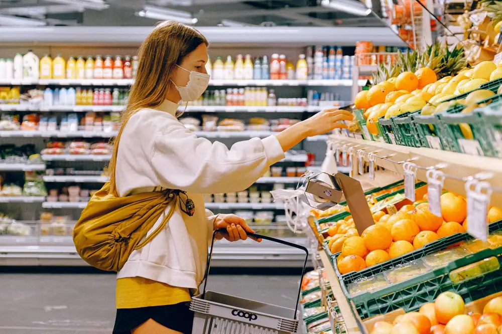 women supermarket shopping